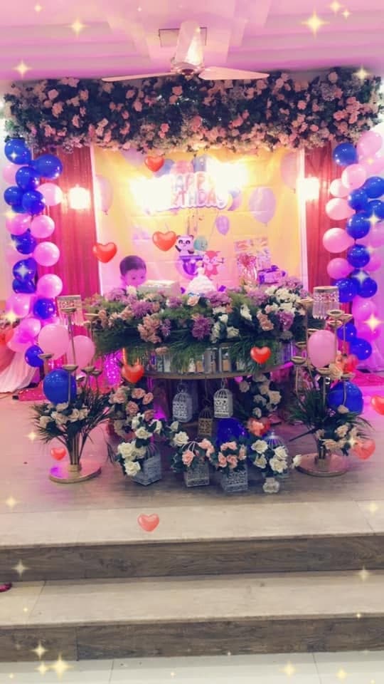 Balloon and flower arch set up for a birthday celebration at Ahmed Palace